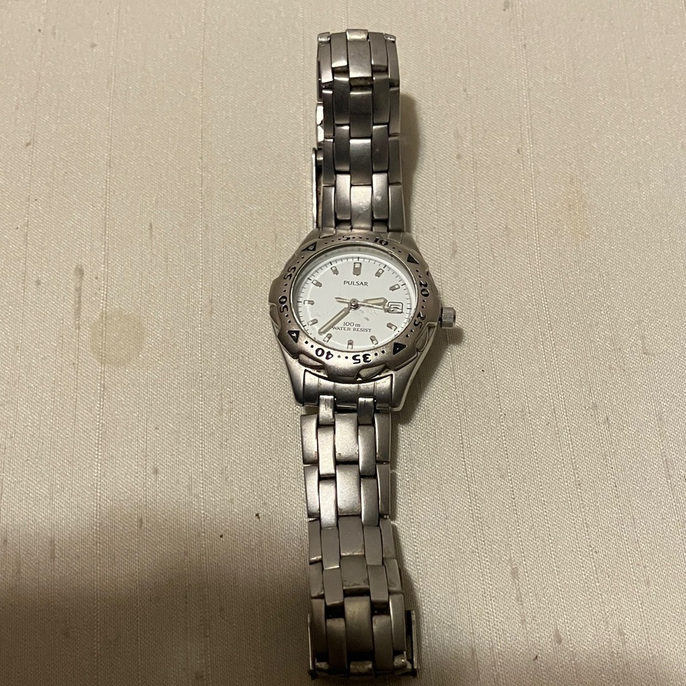 Beautiful , silver Pulsar water resistant , women’s watch with pull on n clip
